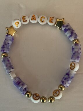 PEACE Purple Beaded Stretch Bracelet with Gold Accents. Handmade by Kim.